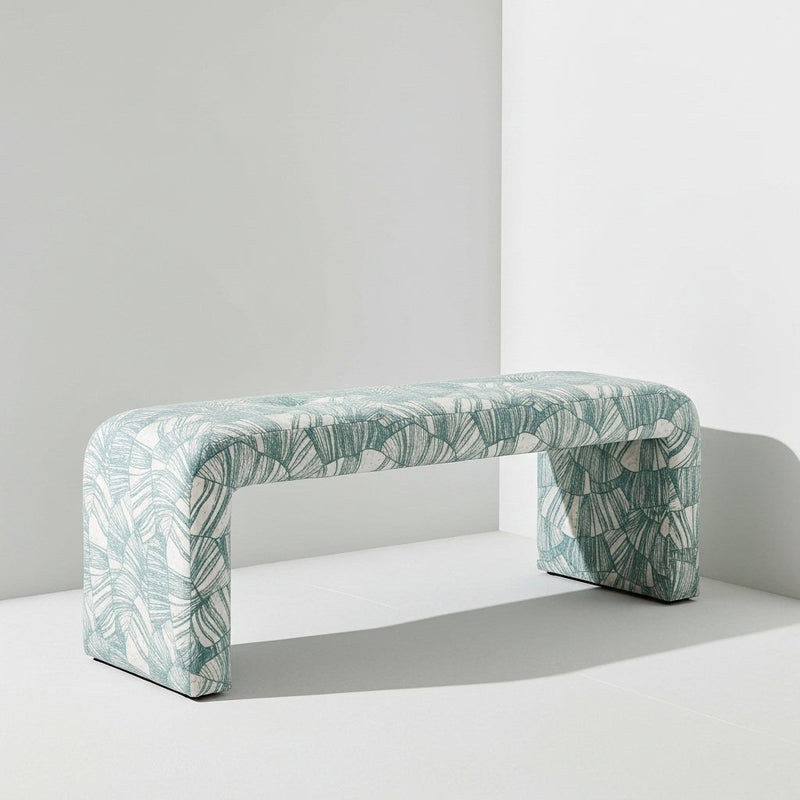 Coastal bench upholstered in a white living room.