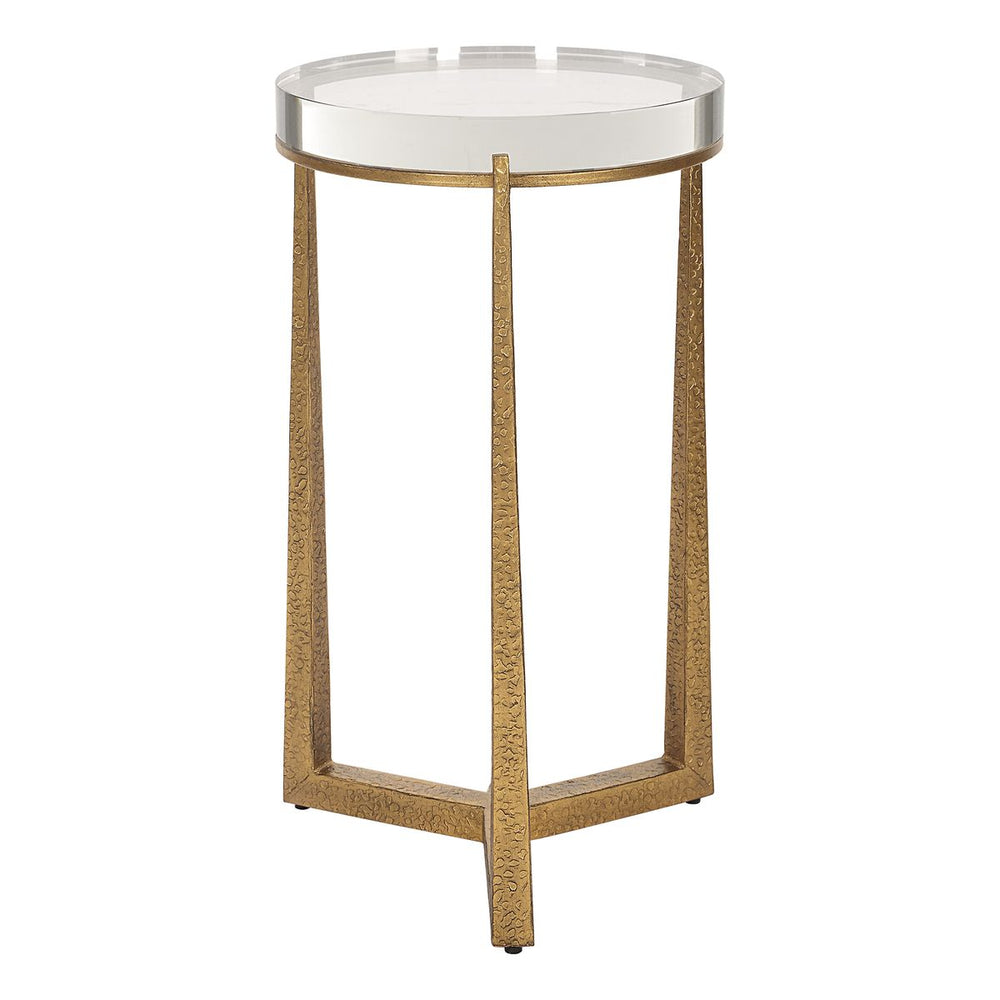 Gold and acrylic drink table that has round surface and sculptural base.