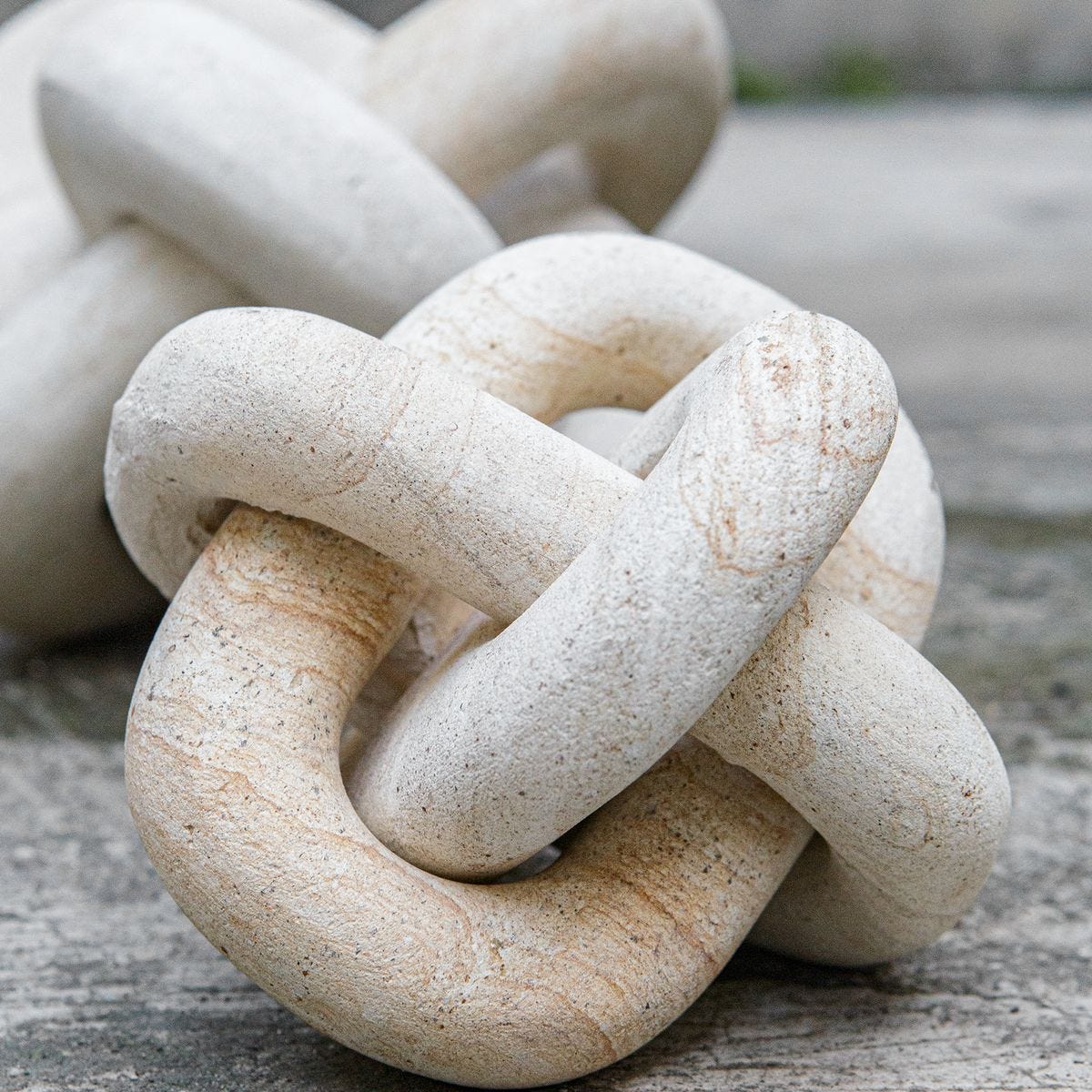 Limestone link sculptures in a living room