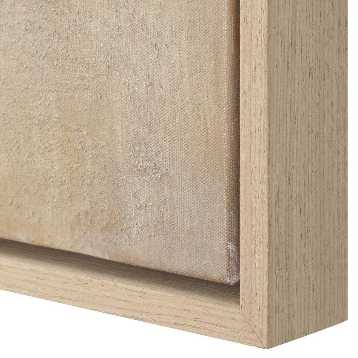 Close-up of a wooden frame corner with a textured beige surface.