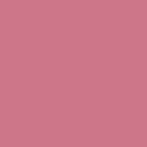 Pink faux orchid styled in a room