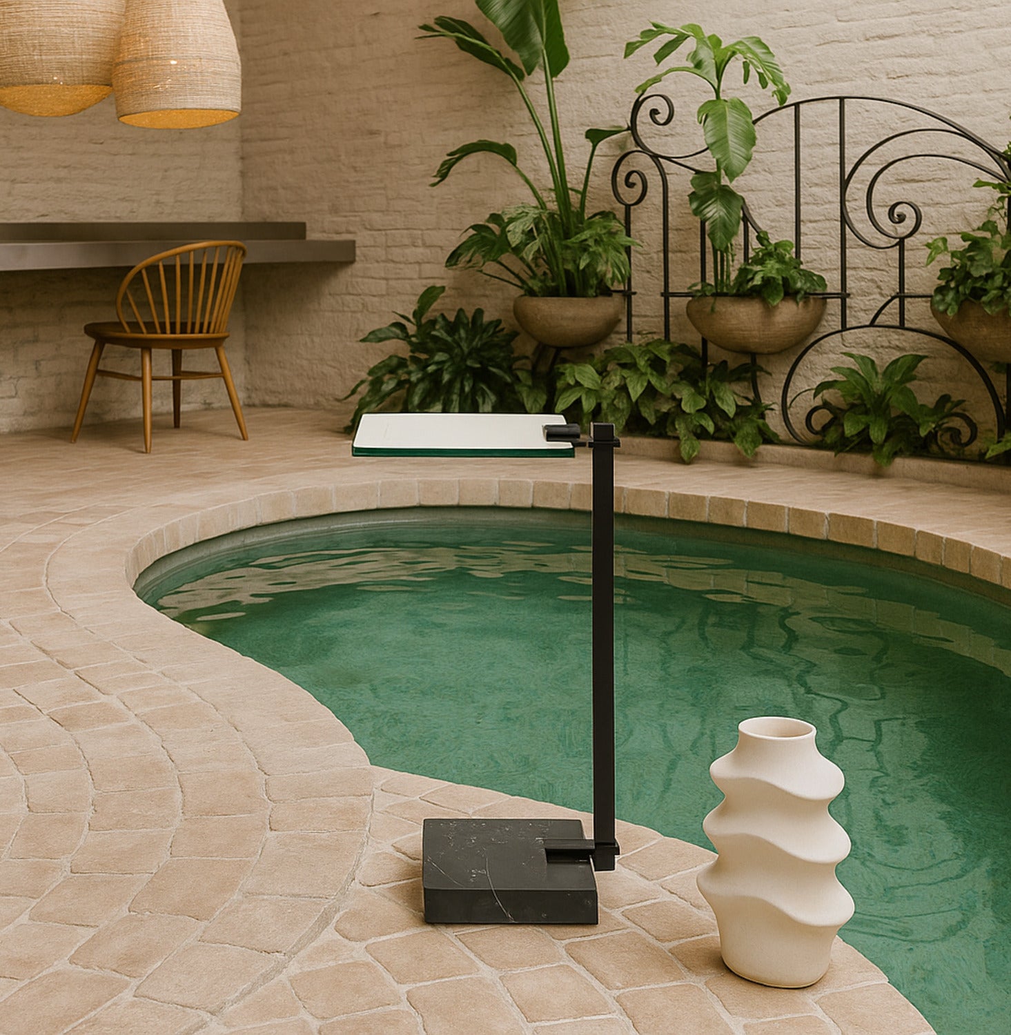Indoor pool area with plants, a chair, and decorative items.