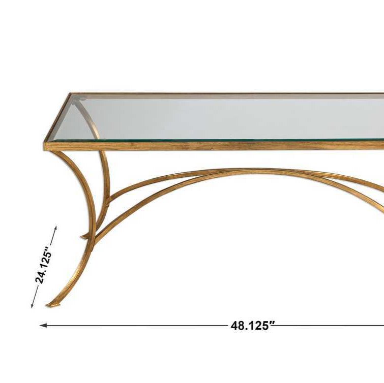 Gold coffee table with glass top and dimensions on a white background