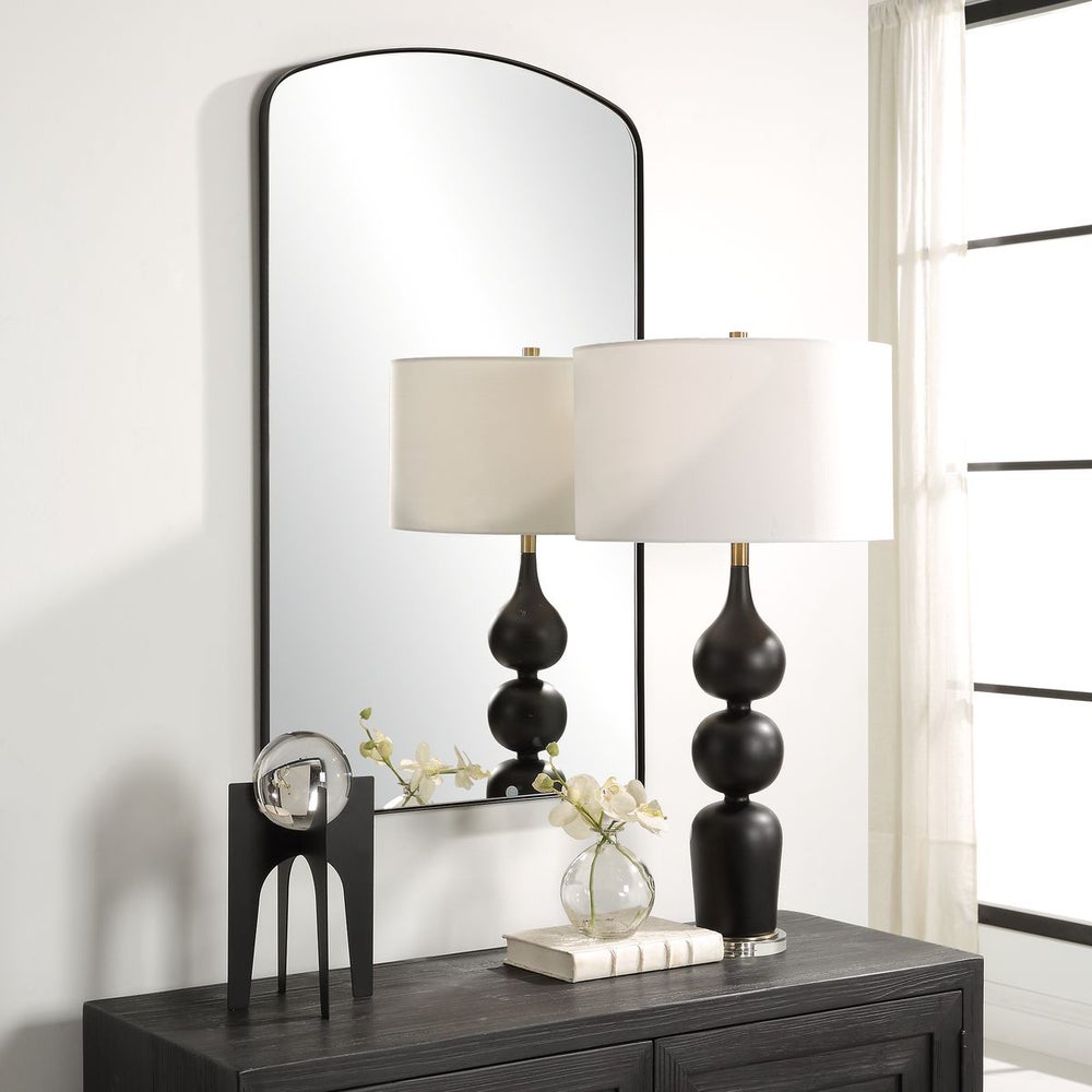 Black Arched Mirror in Entryway.