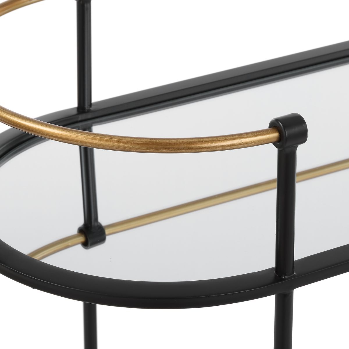 Glass shelf with black and gold metal frame on a white background