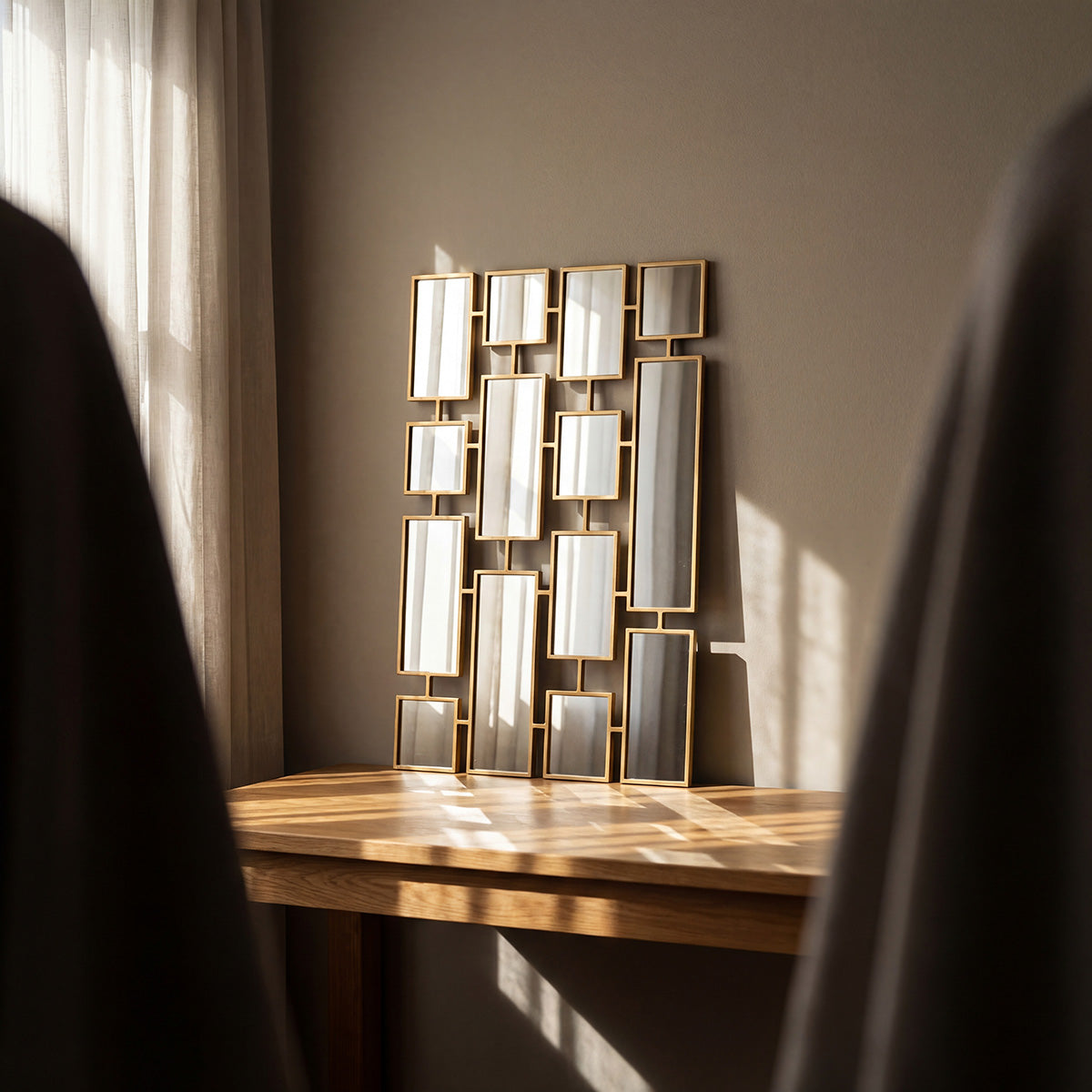 Gold art deco mirror framed on table