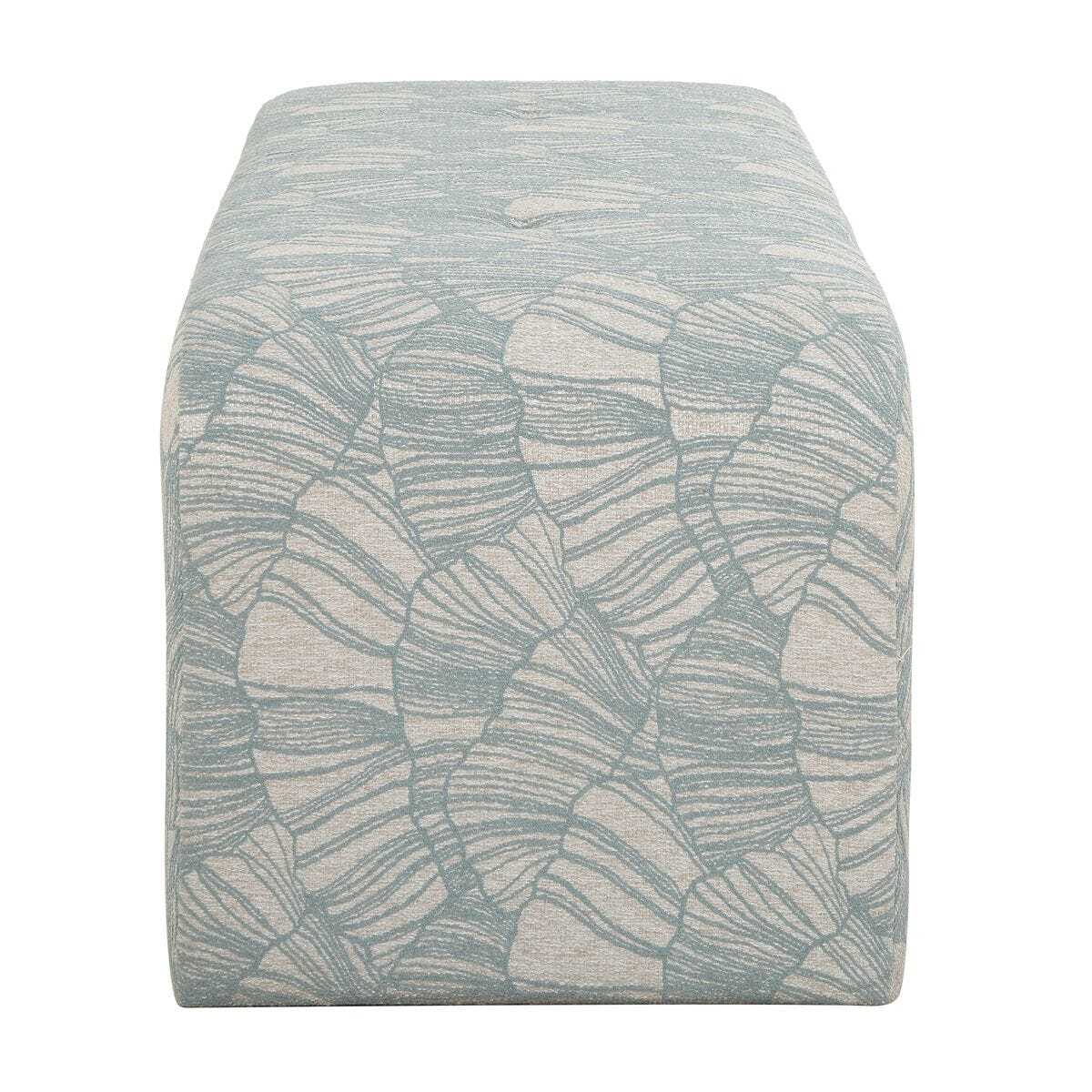 Patterned cube-shaped ottoman on a white background