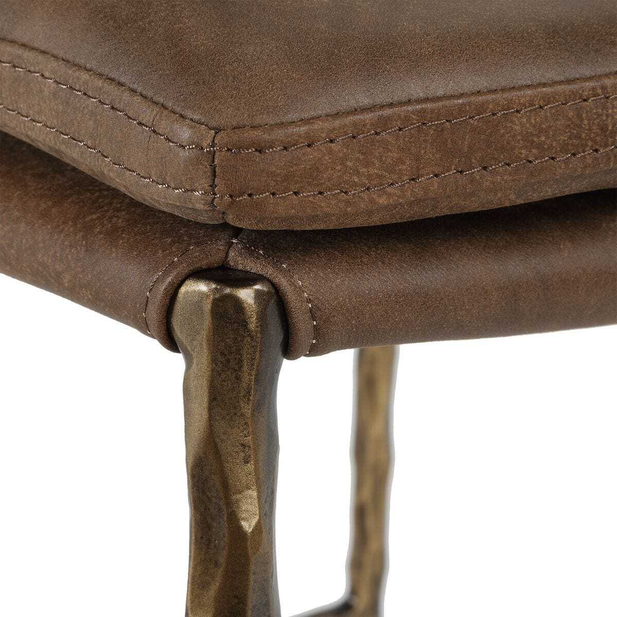 Leather counter stool with bronze sculpted legs.