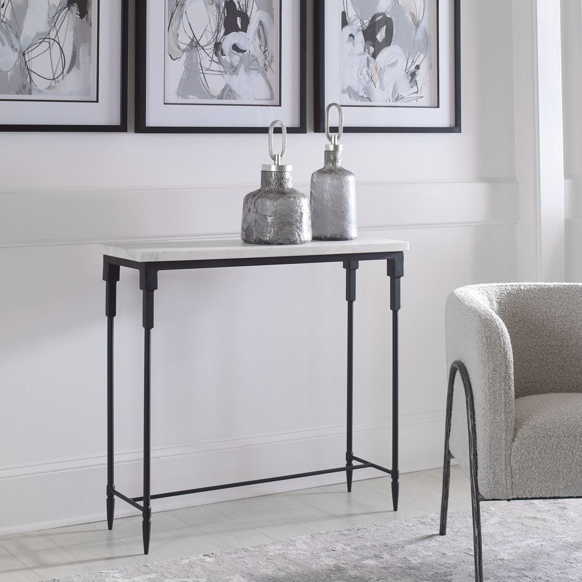 Console table with decorative items in a living room setting