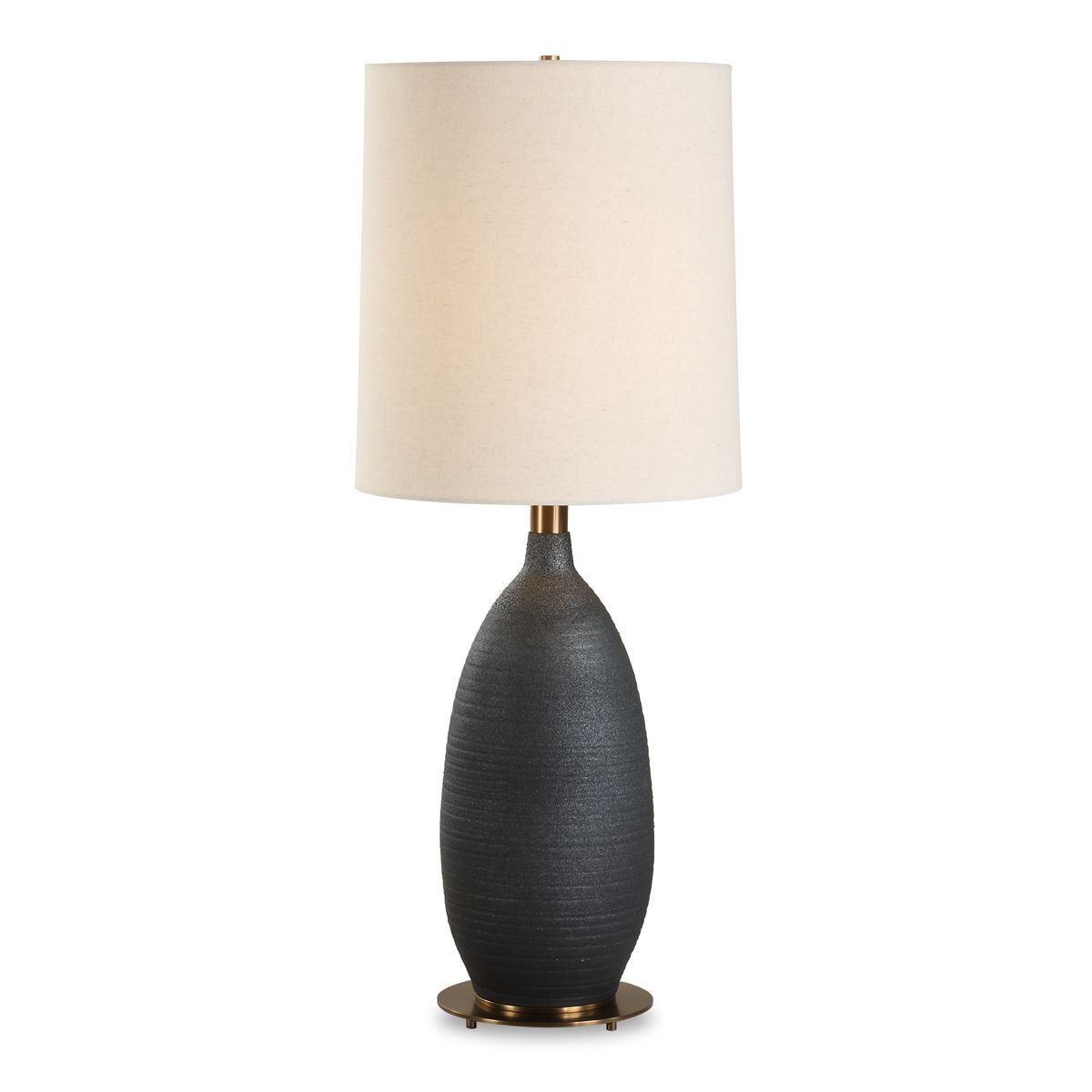 Table lamp with a dark gray base and beige lampshade on a white background