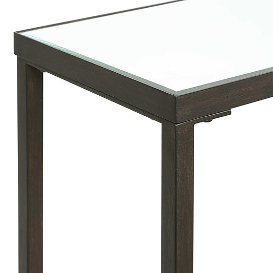 Slim Black Console table in a minimalistic room with concrete floor and walls