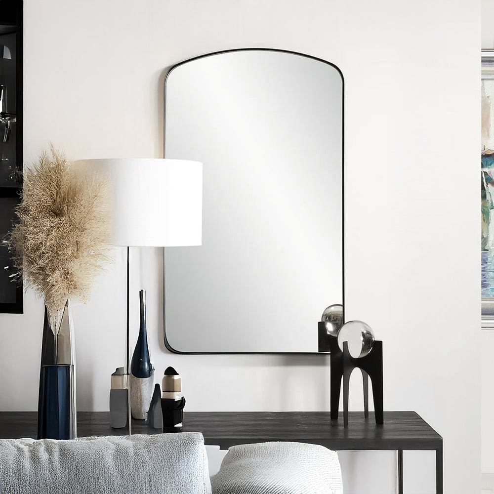 Black metal mirror with arch.
