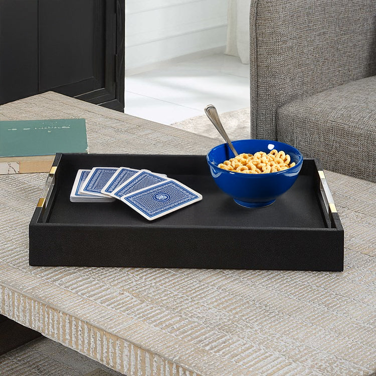 Black coffee table tray on white surface with cereal and cards.