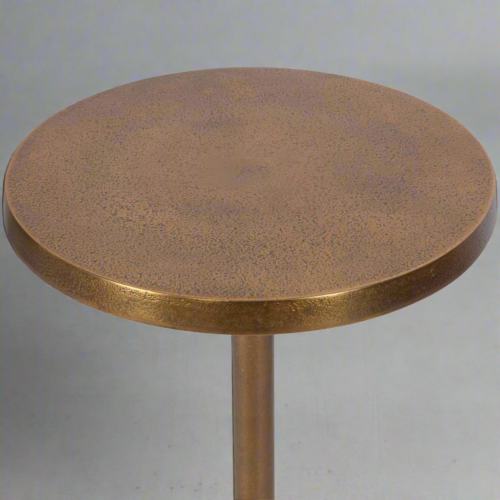 Brass drinking table surface.