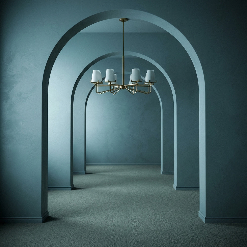 Chandelier hanging in a long, arched hallway with a blue color scheme.