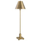 Skinny and tall brass table lamp against a white background.