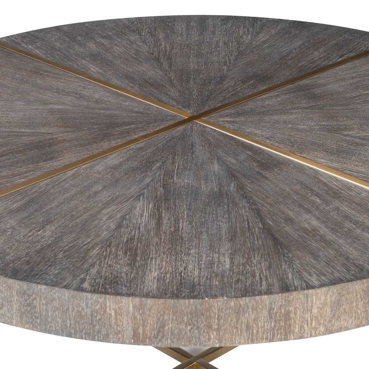 Round wooden table with gold accents on a white background