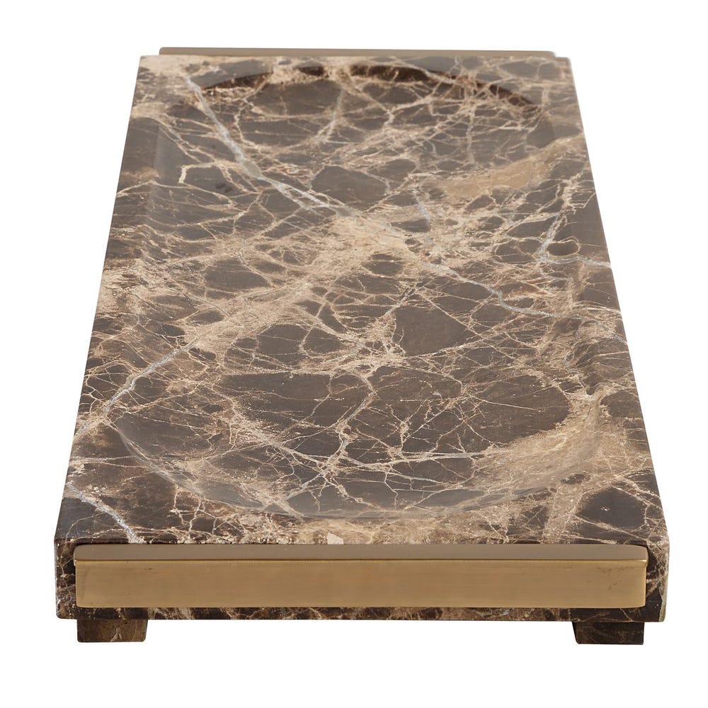 Marble-patterned table with gold base on a white background