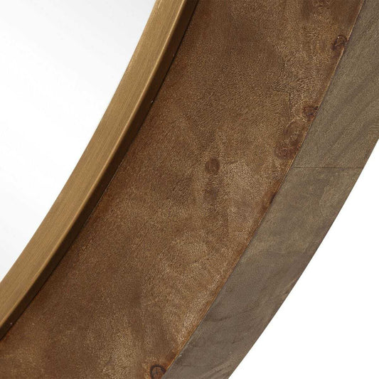 Burl wood mirror in a circular frame.