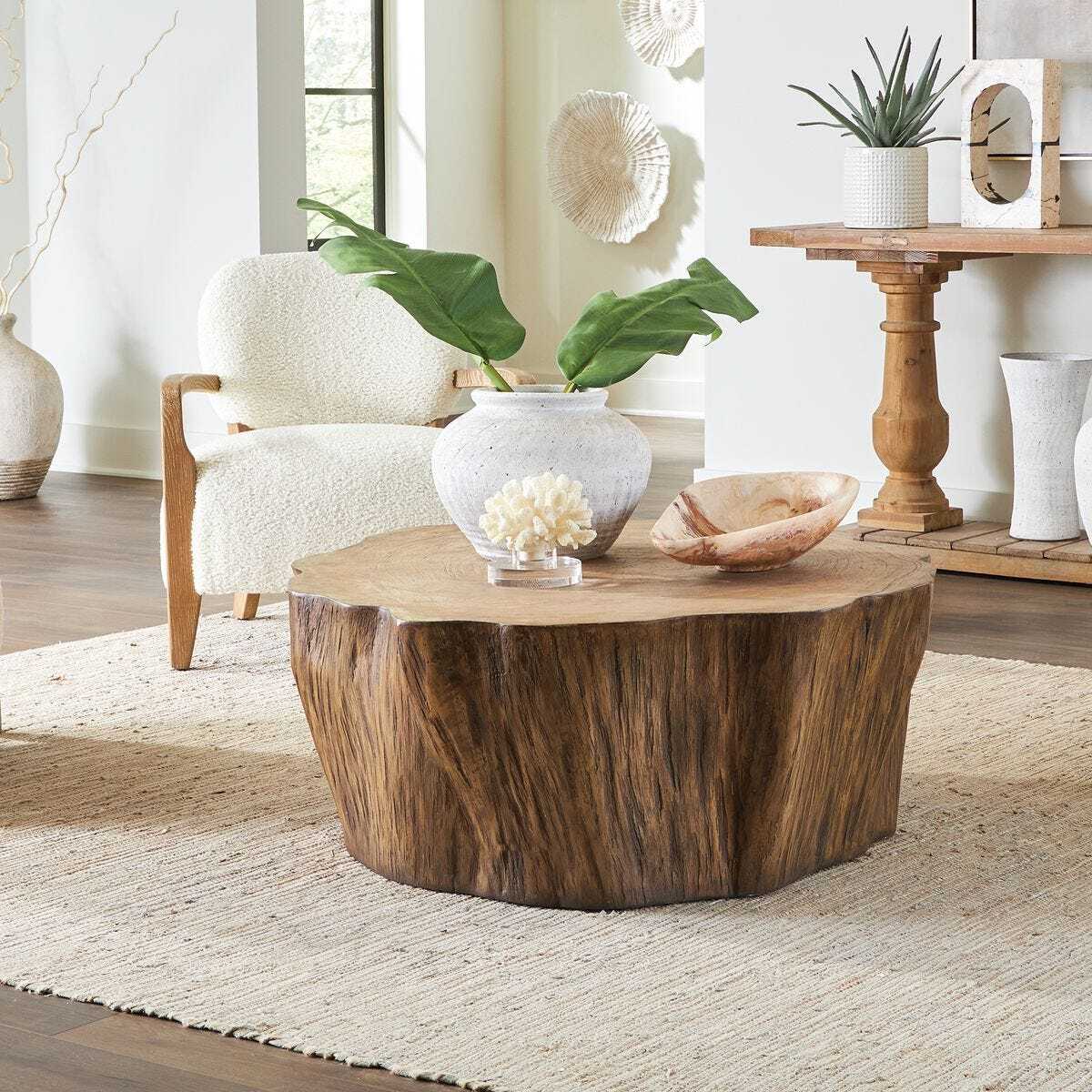 Wooden coffee table in a living room setting with decor elements.