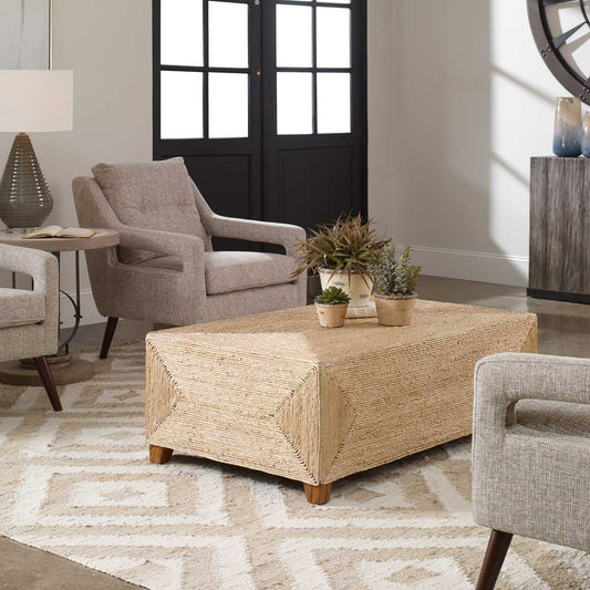 Rectangular woven coffee table on a white background