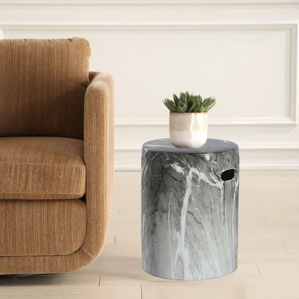 Marble Accent Table Next to Sofa with Plant on Top 