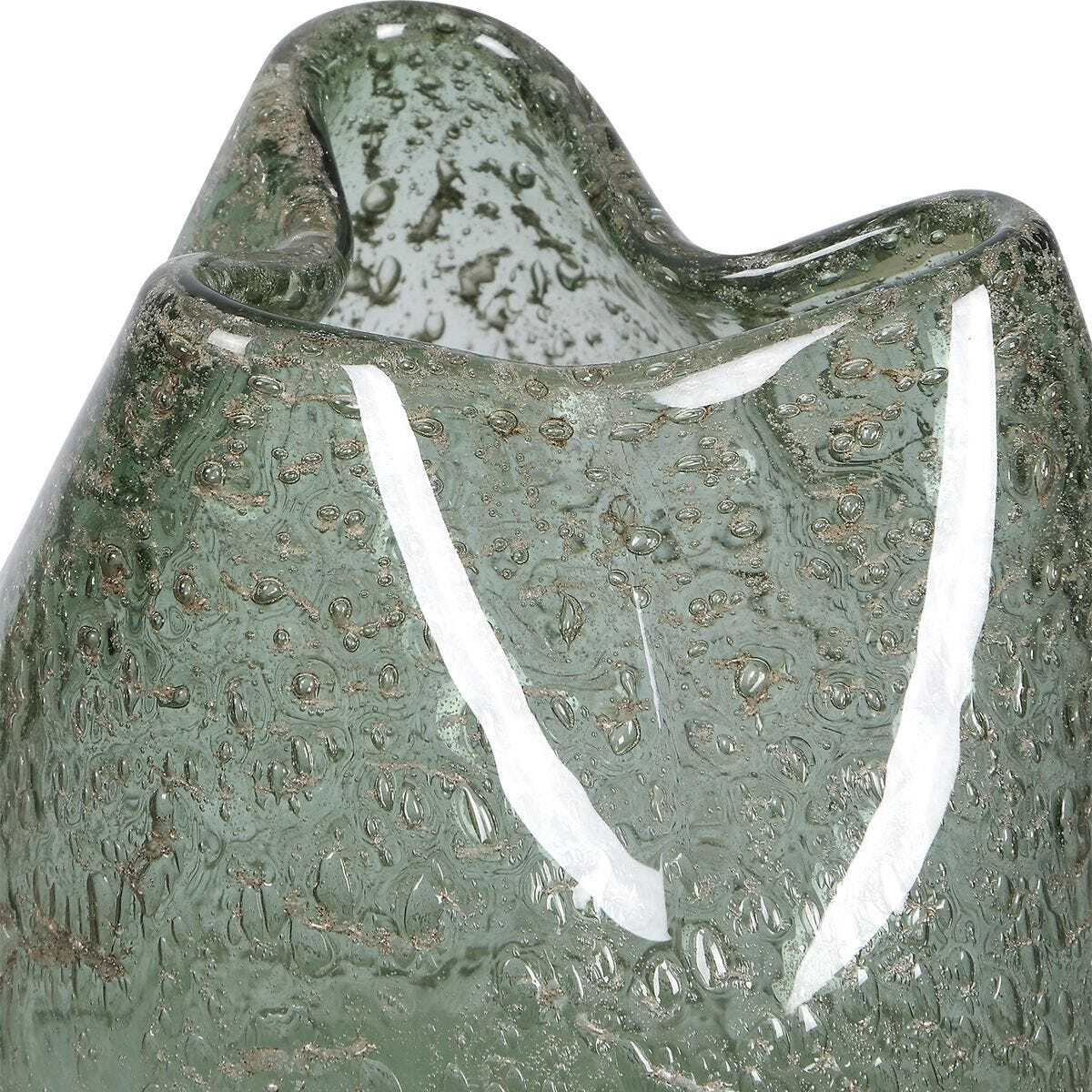 Green glass vase with textured surface on a white background