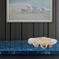 Shell bowl on blue console table blue.