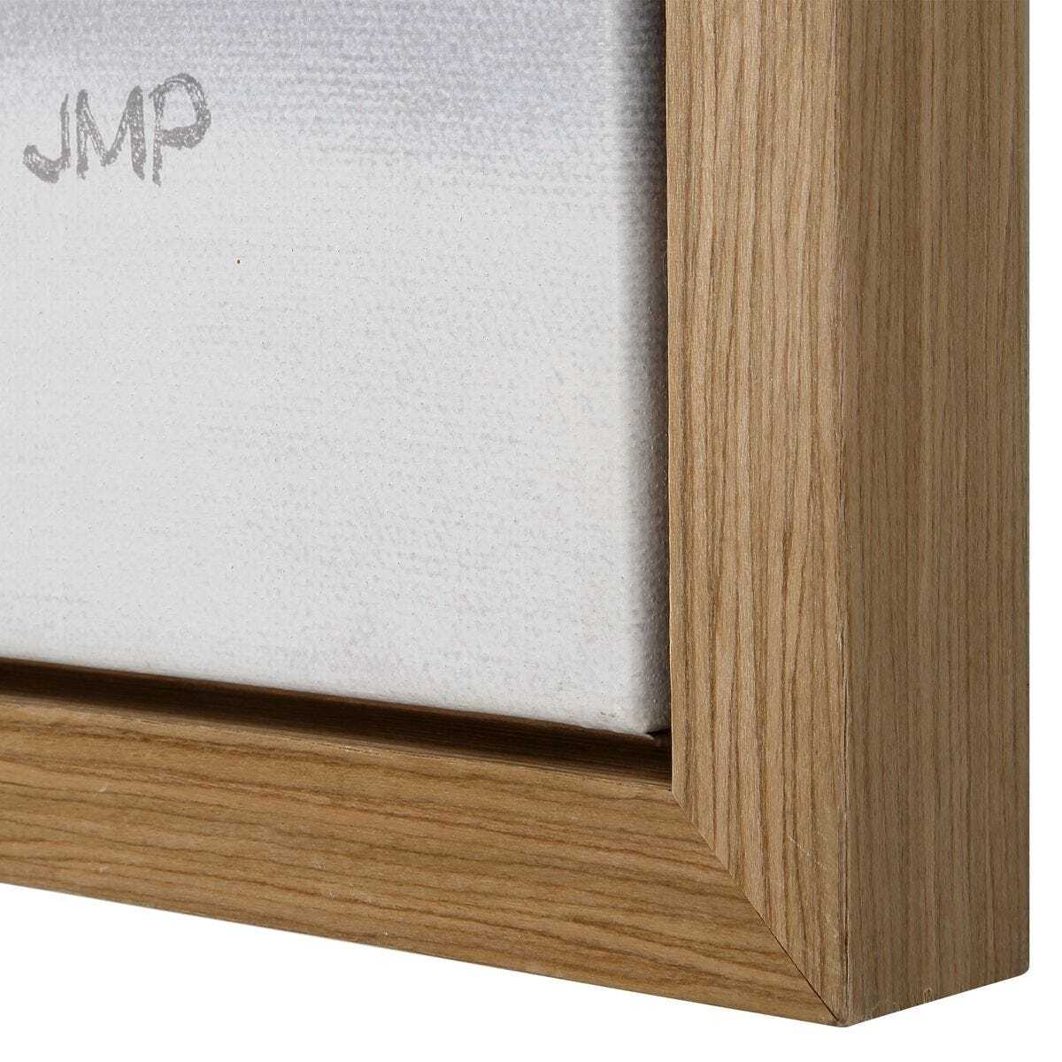 Close-up of a wooden picture frame corner with 'JMP' branding.