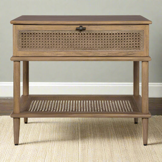 Coastal End Table on coastal rug and green wall.