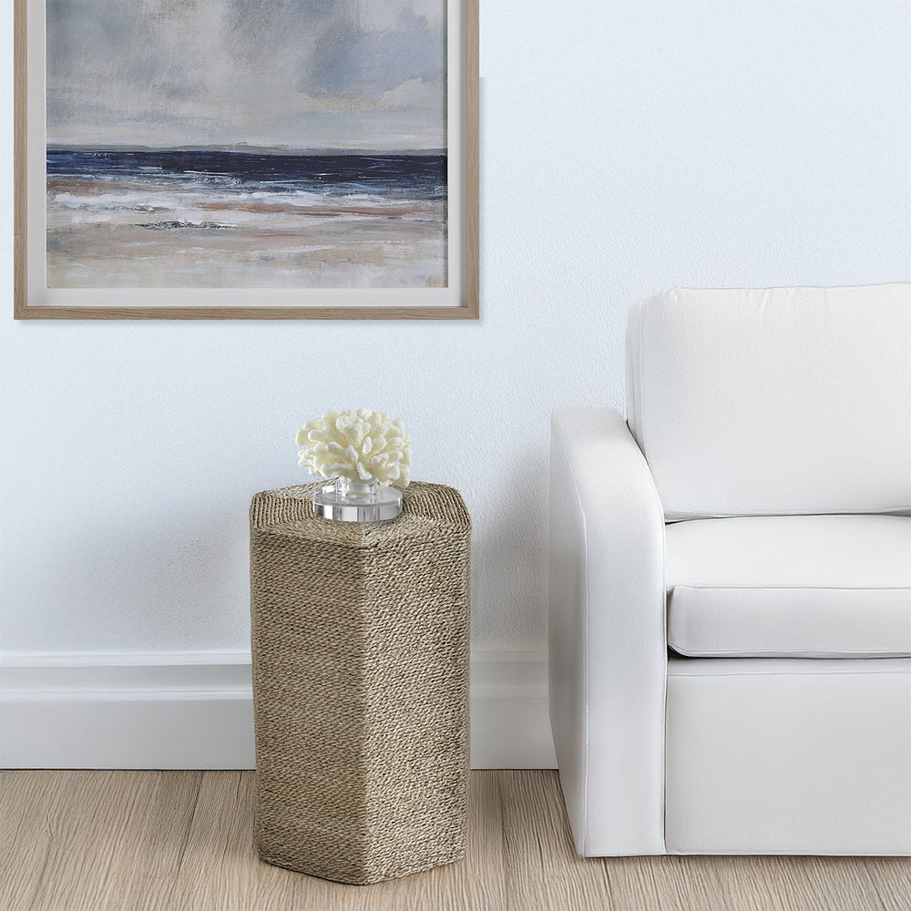 Seagrass end table in living room with coastal accent table.