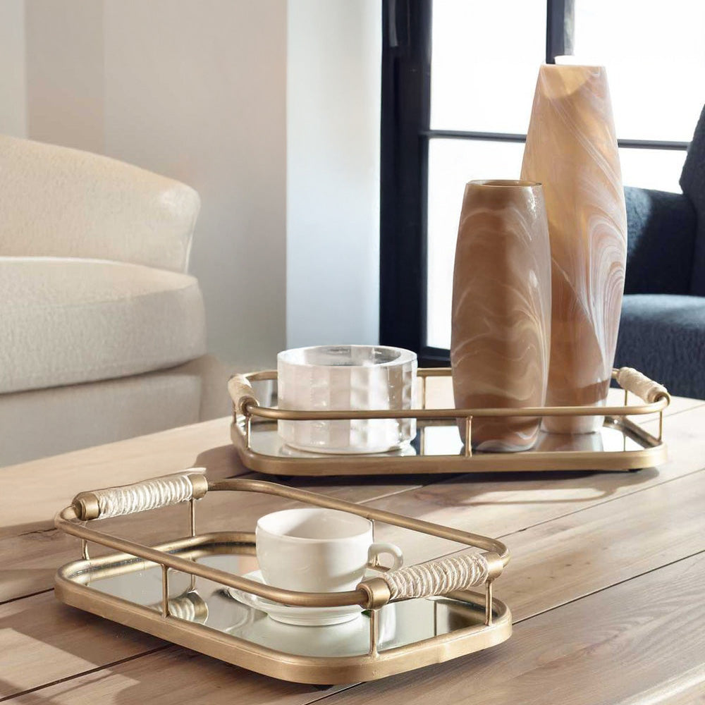 Gold Coastal Trays on Wooden Coffee Table.