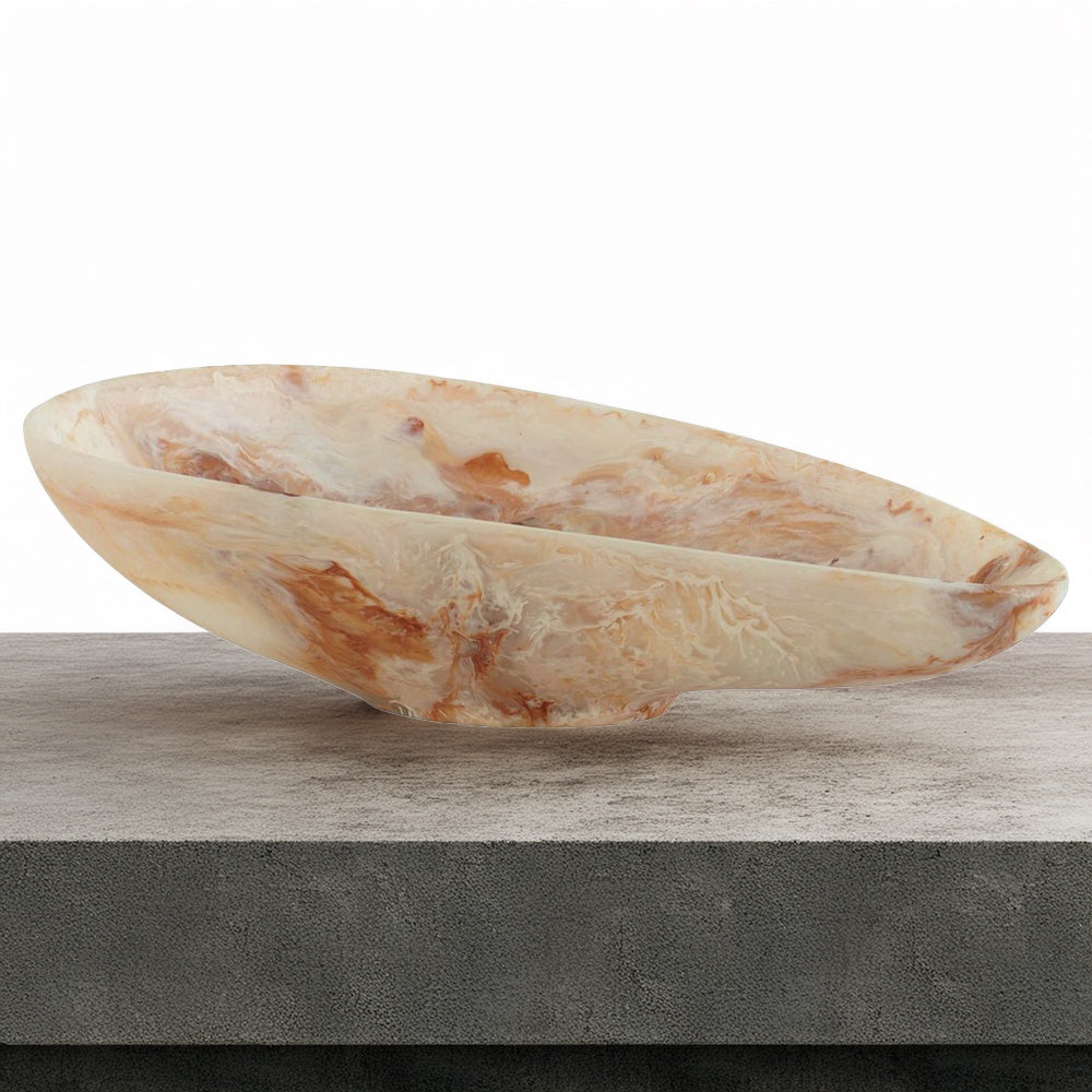 Marbleized bowl on concrete kitchen counter.