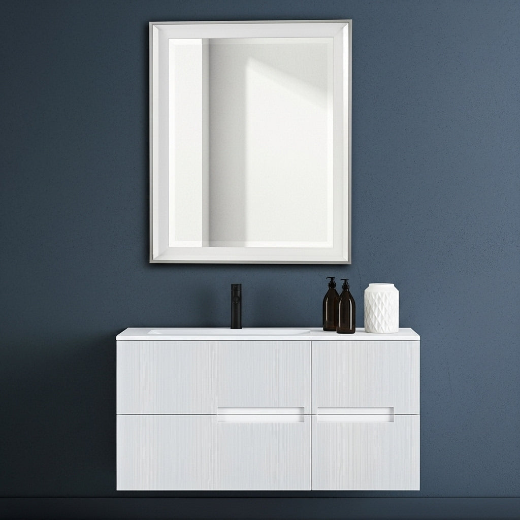White bathroom vanity with mirror against a dark blue wall