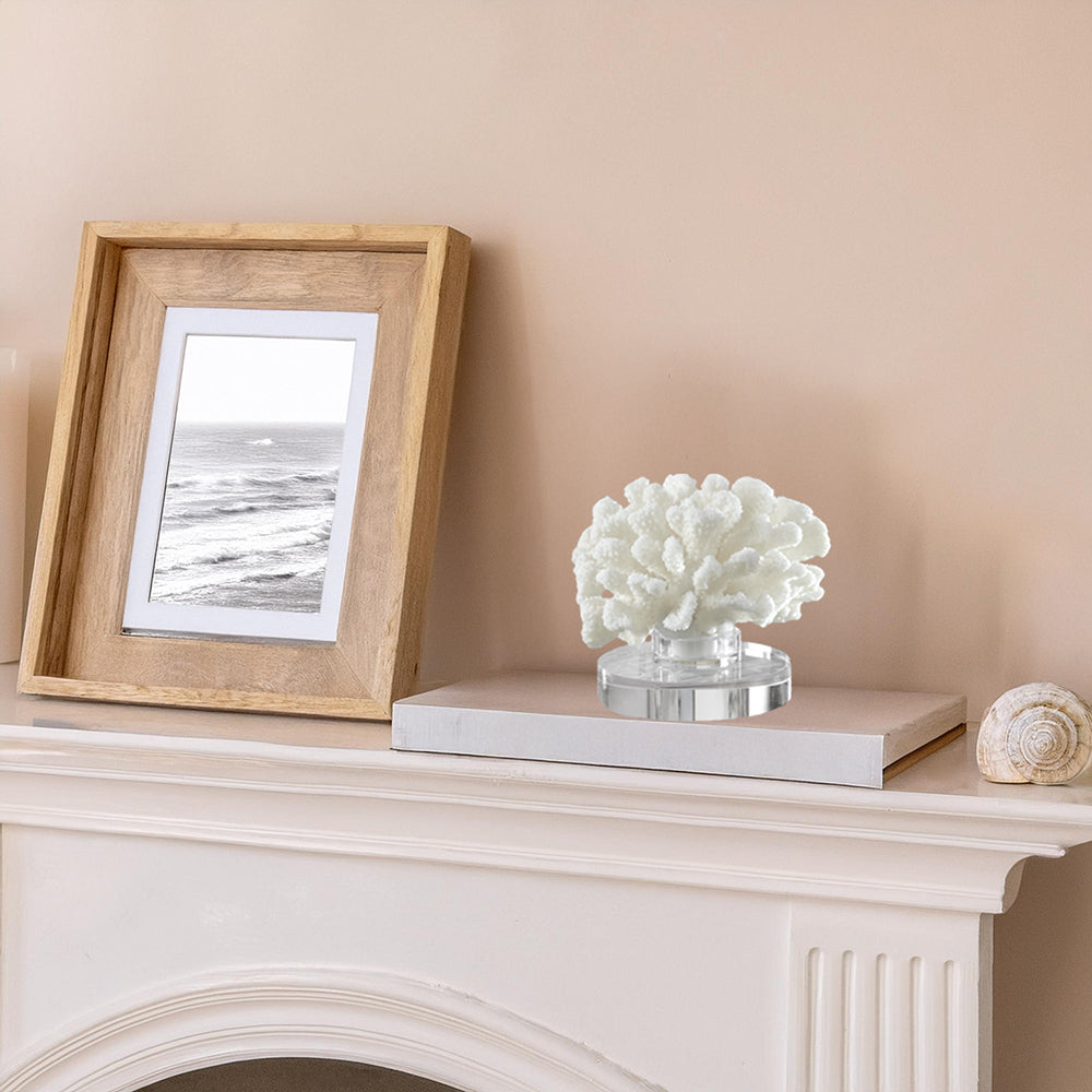 White Coral sculpture on coastal fireplace.