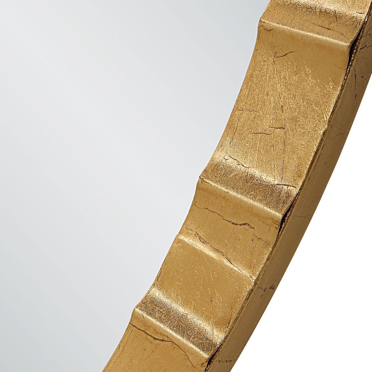 Close-up of a gold ingot on a white background