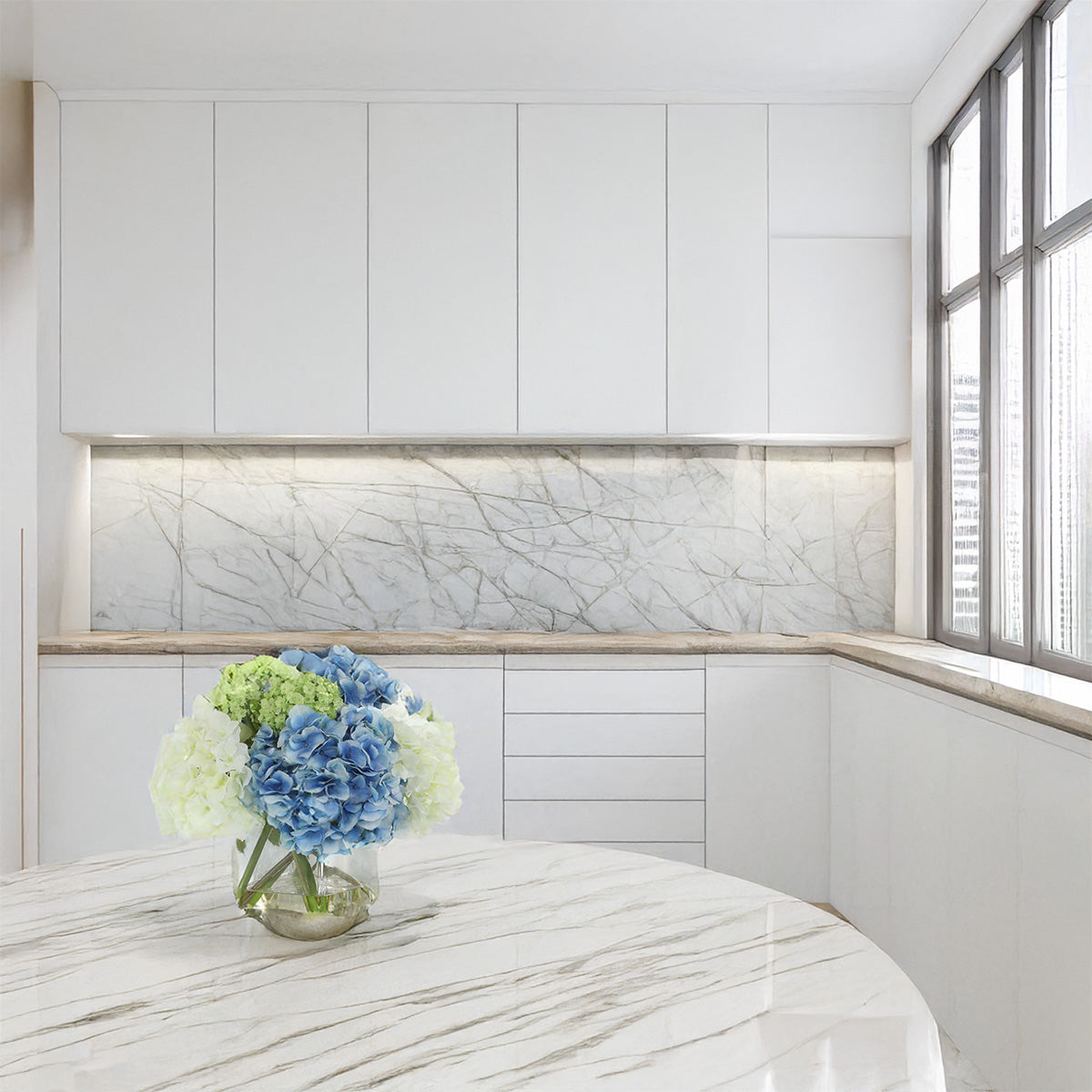 Faux hydrangeas to decorate a white marble table and kitchen counters.