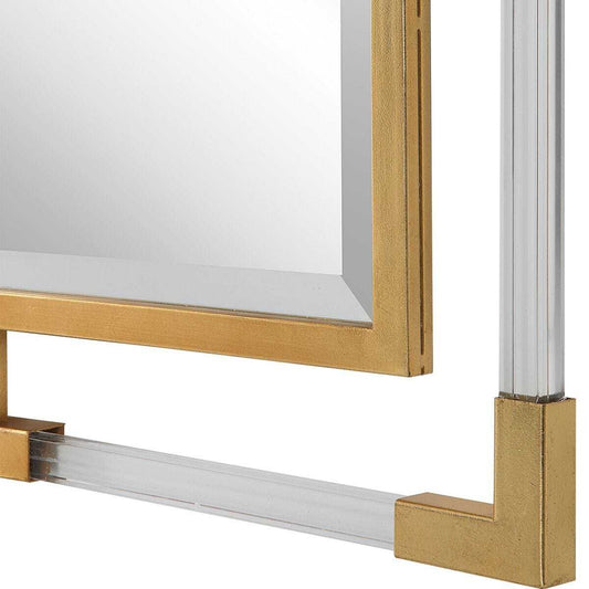 Full-length mirror with gold and white frame on a white background