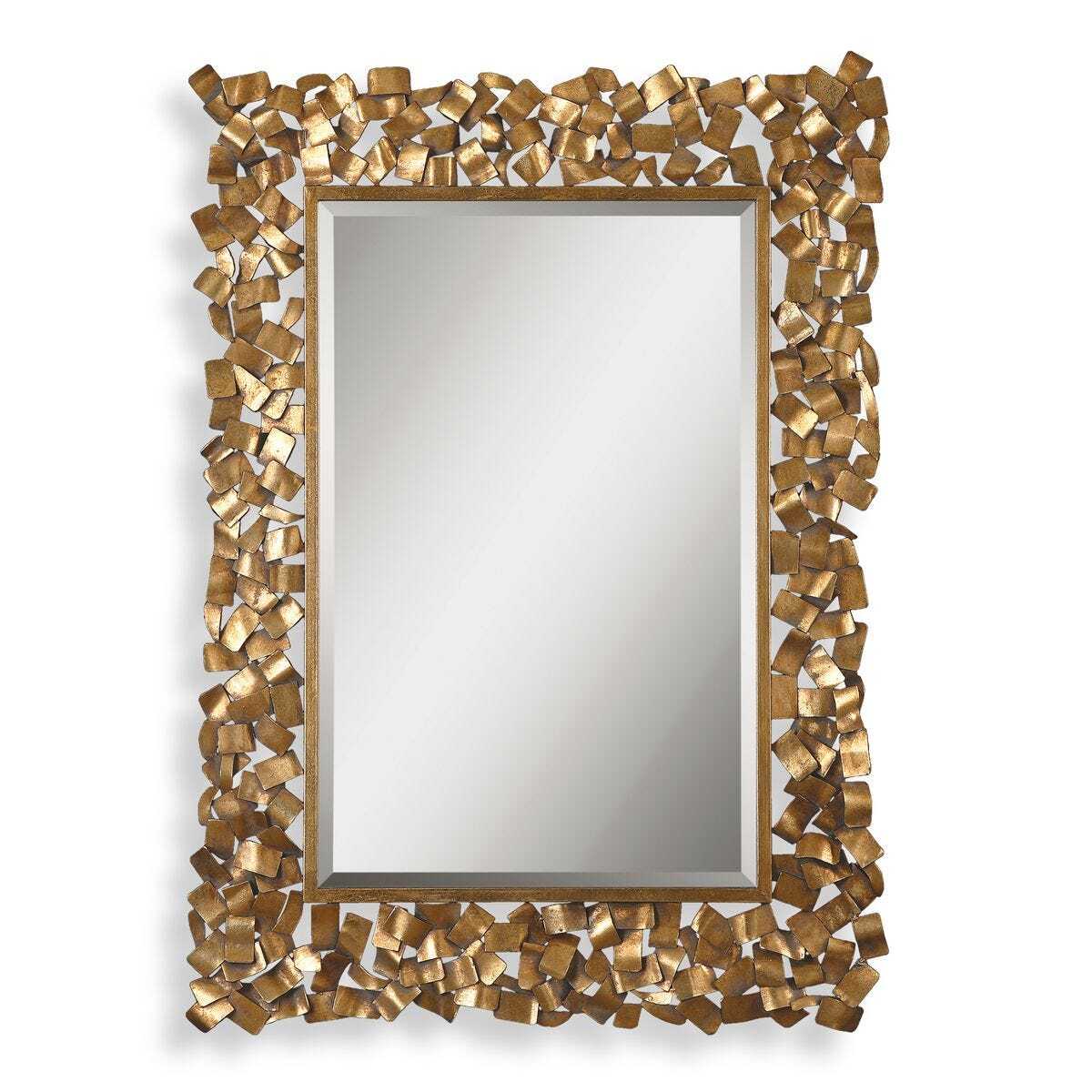Decorative gold mirror with intricate frame design on a white background