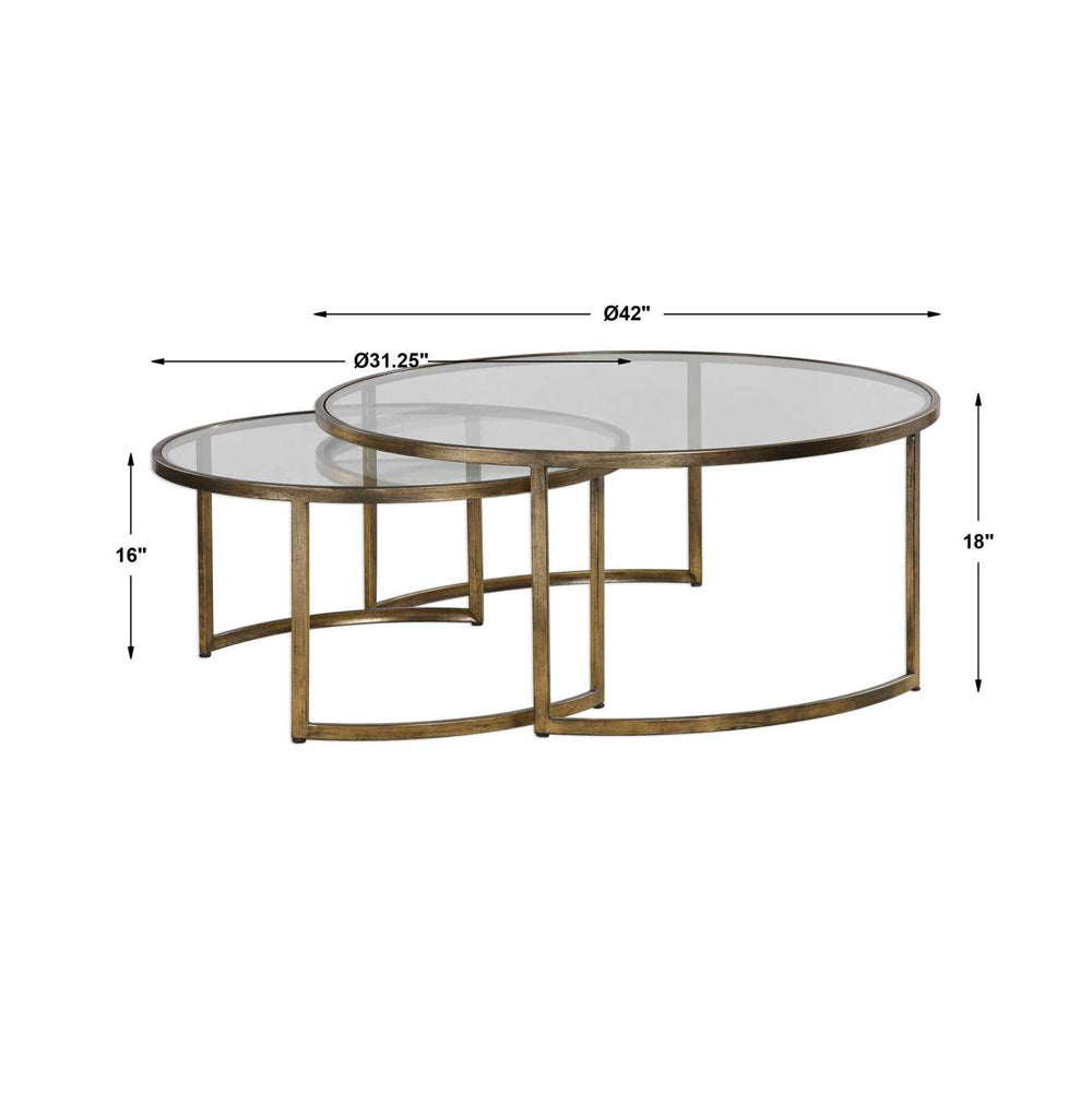 Set of two gold coffee tables with glass tops and dimensions on a white background