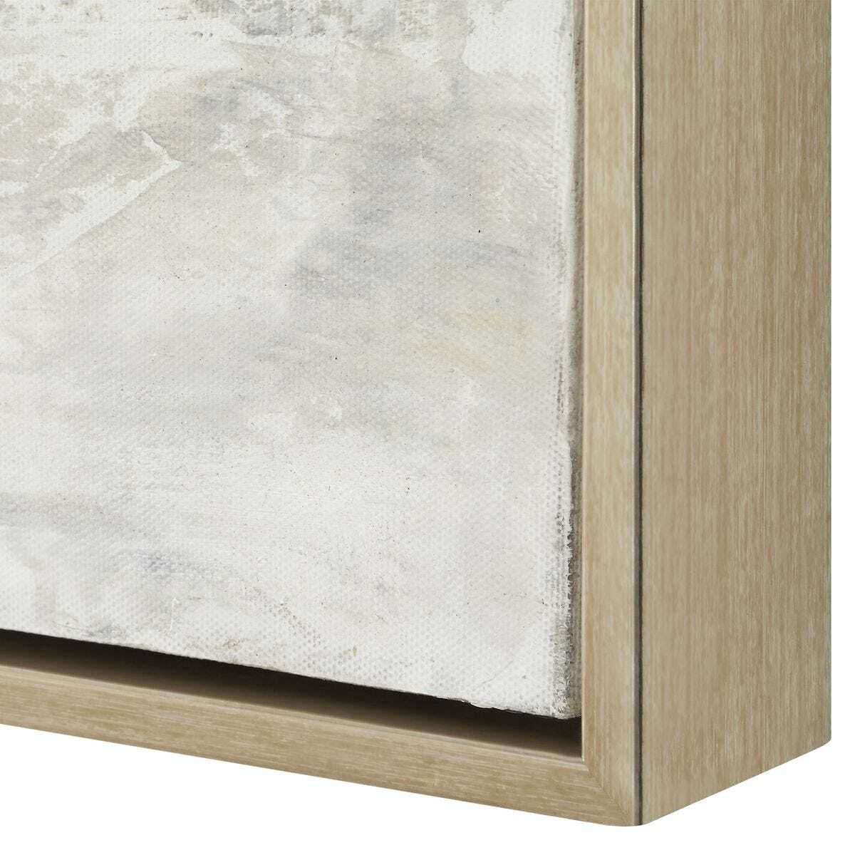 Close-up of a piece of furniture with a marble-like finish and wooden frame.