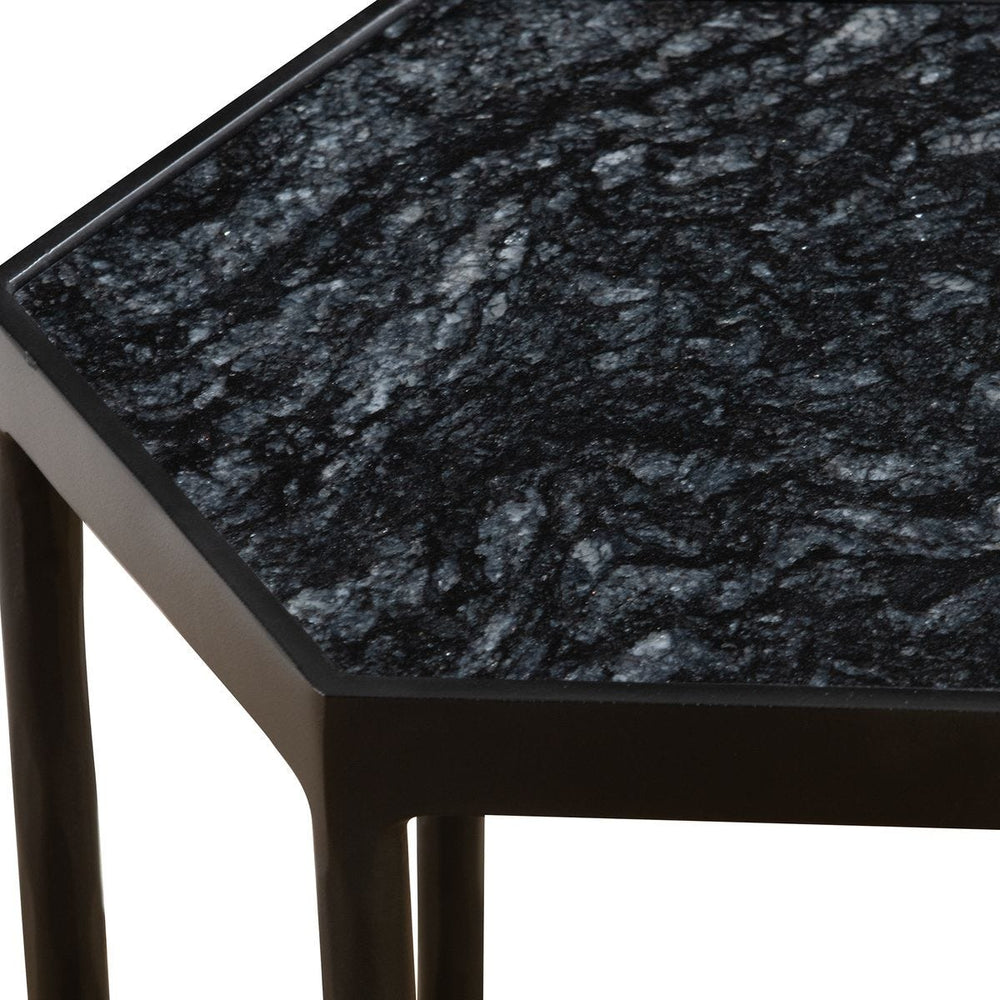 Black marble side table on a white background