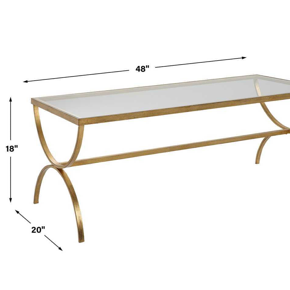 Gold coffee table with dimensions on a white background