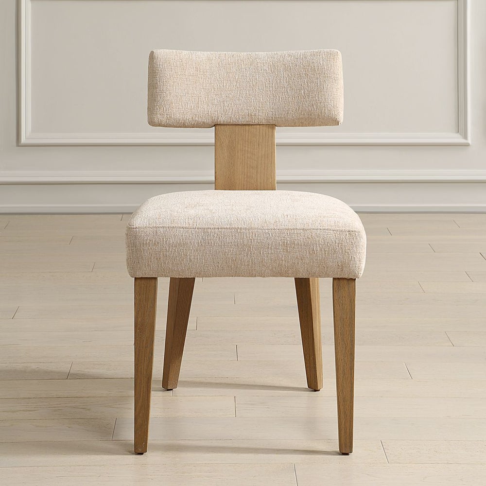 Natural sand color Kismo back dining chair in 100% polyester fabric.