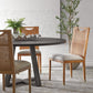 contemporary rattan dining chair set next to round dining table