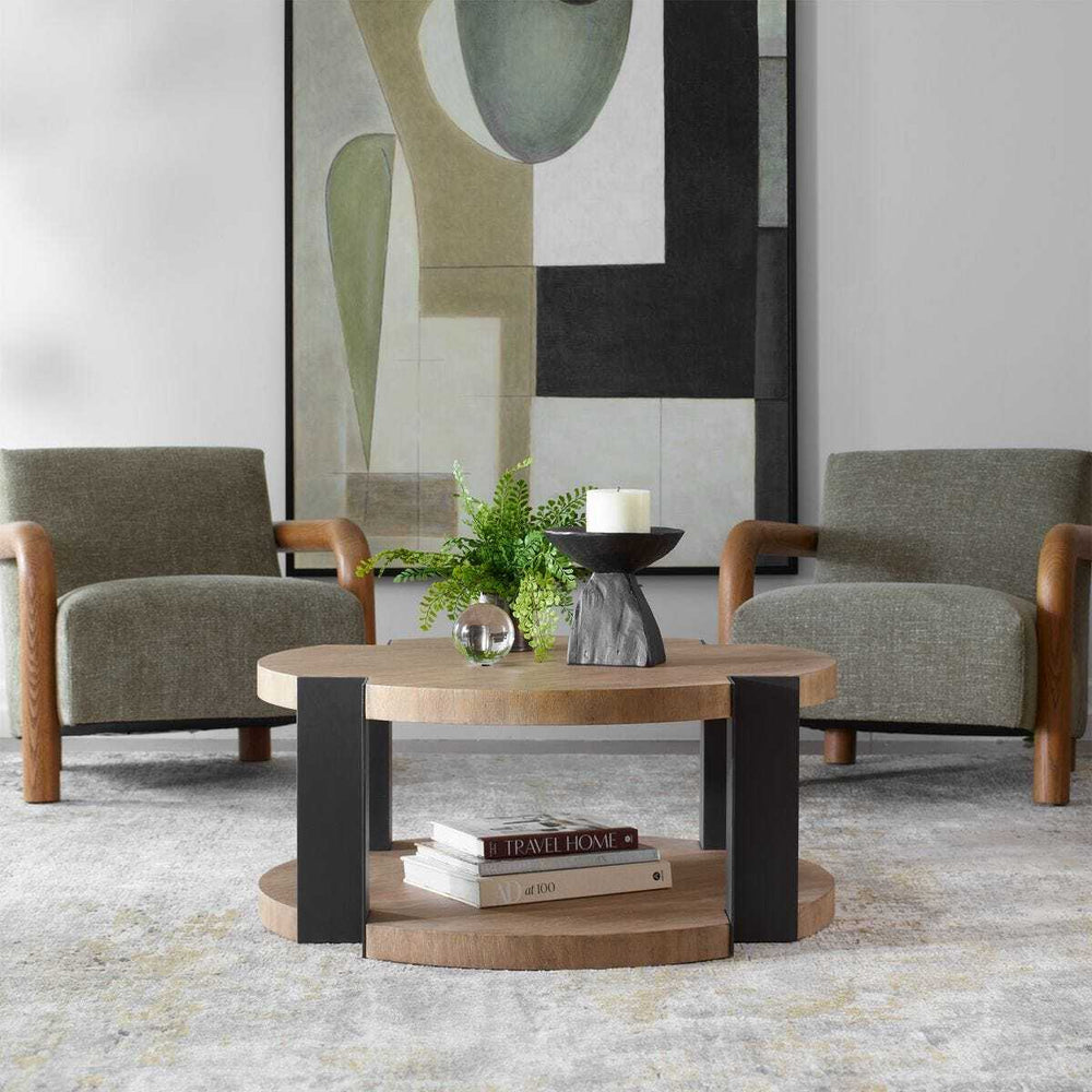 Modern living room with two armchairs and a coffee table.