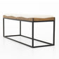 Angled view of boucle josephine bench with wood top surface and black iron frame.