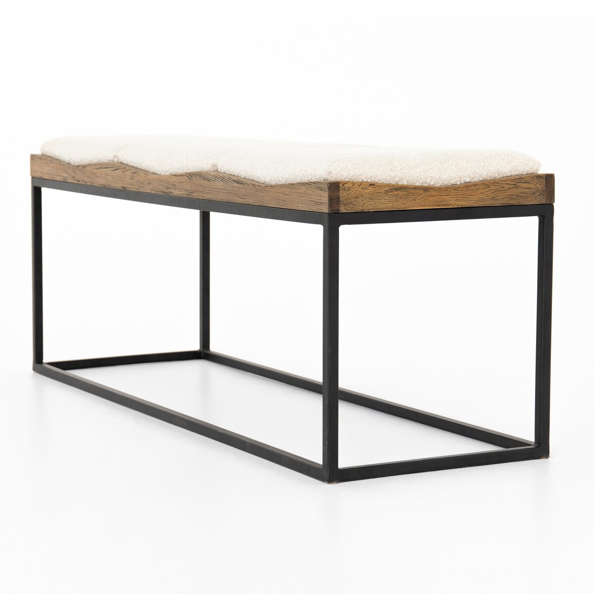 Angled view of boucle josephine bench with wood top surface and black iron frame.