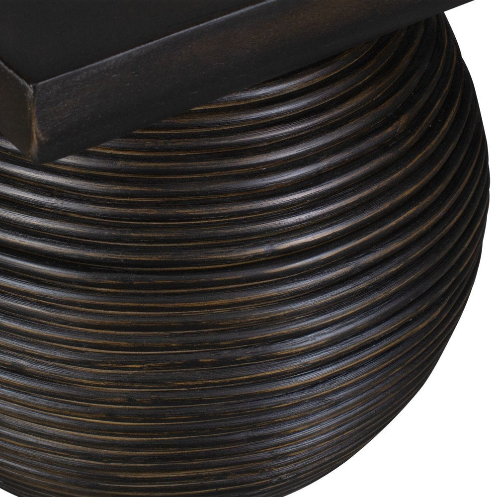 Close-up of a black woven basket on a white background