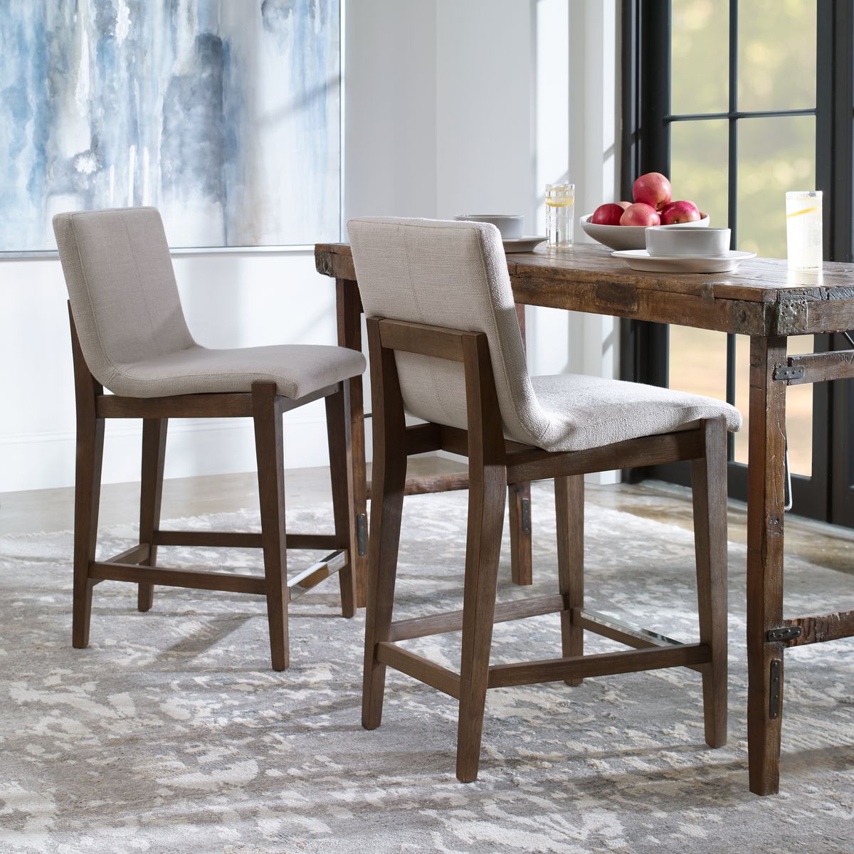 Klemens counter stool at a bar table.